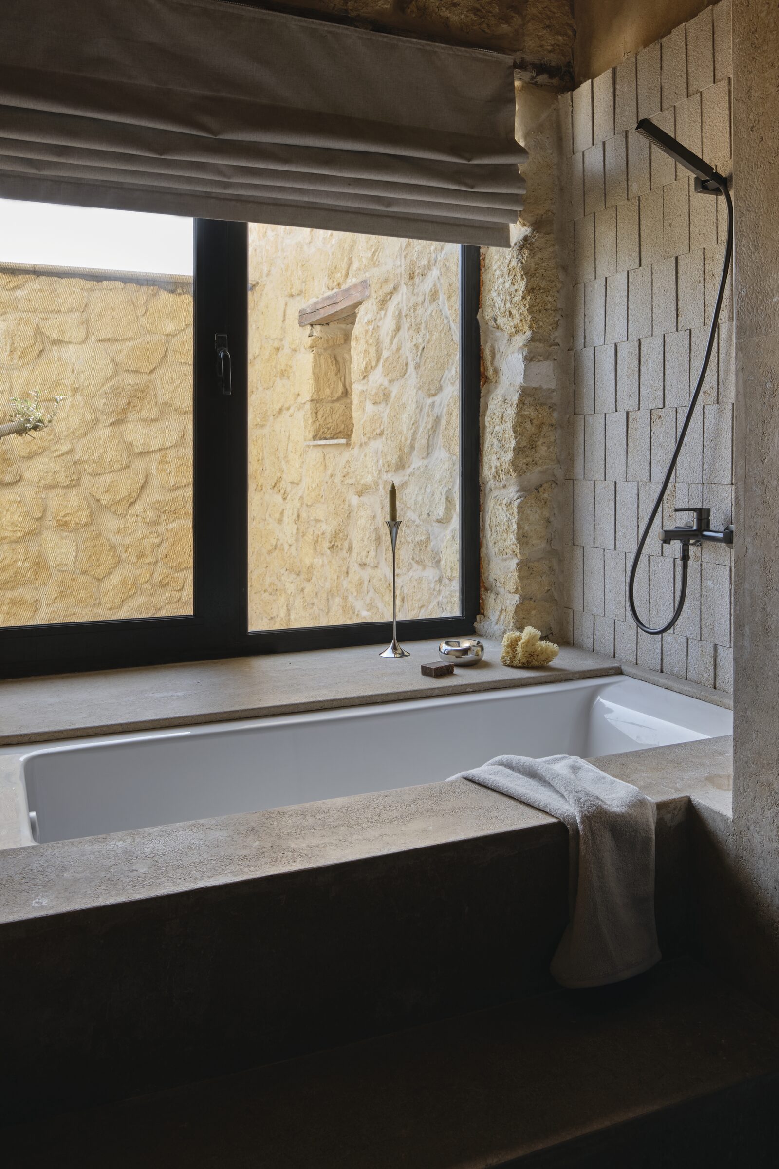 Stone wall meeting the lake